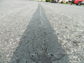 Герметик длязаливки швов на асфальте в холодном виде  GatorPave